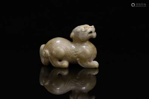 A JADE CARVED ORNAMENT