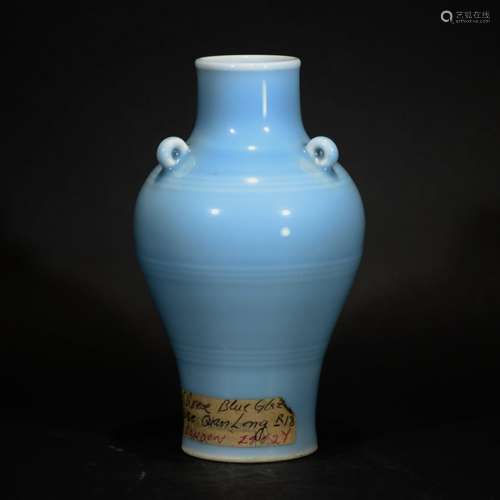 A LIGHT BLUE GLAZED BOTTLE VASE