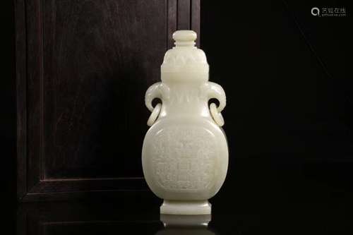 A JADE CARVED FLAT VASE AND COVER