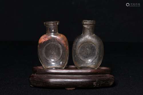 A PAIR OF PEKING GLASS SNUFF BOTTLES