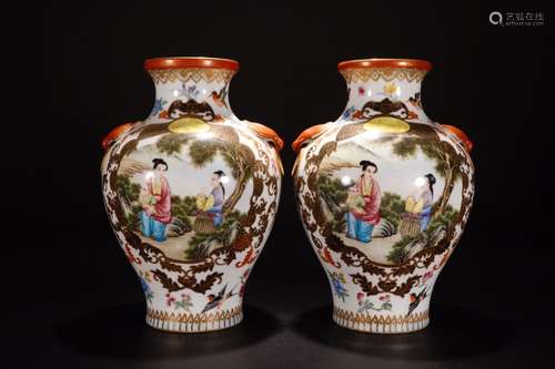 A PAIR OF GILT-DECORATED PAINTED ENAMEL VASES