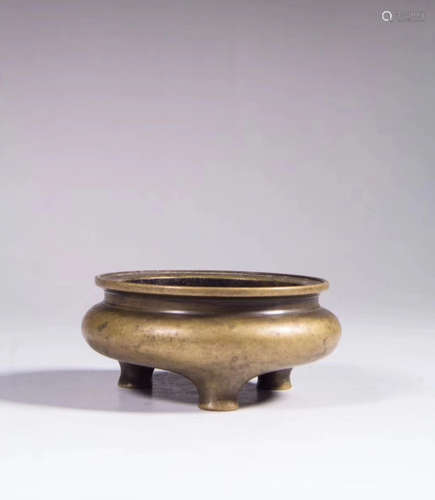 A GILT-BRONZE TRIPOD CENSER