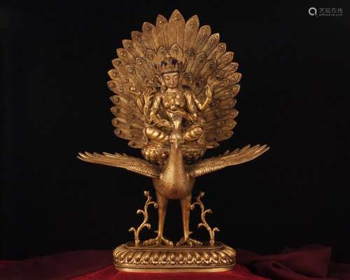 A GILT-BRONZE FIGURE OF BUDDHA