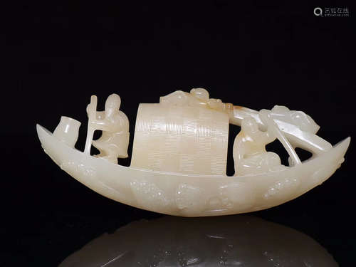 A JADE FISHING BOAT SHAPED ORNAMENT