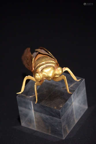 A CICADA DESIGN GILT SILVER ORNAMENT