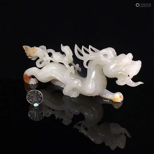 A HETIAN JADE ORNAMENT OF STORY SHAPED