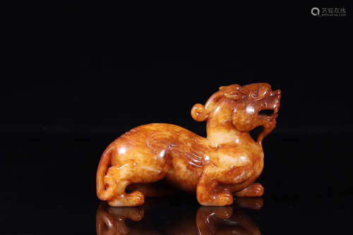 A HETIAN JADE  ORNAMENT OF AUSPICIOUS BEAST