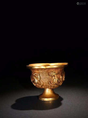 A GILT BRONZE HIGH FOOT CUP WITH PATTERN