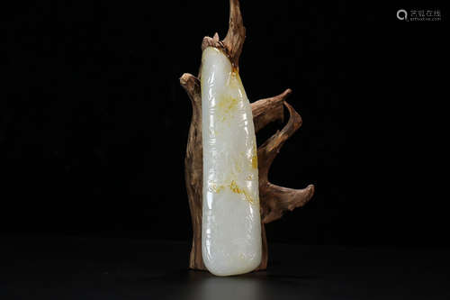 A HETIAN JADE STORY ORNAMENT