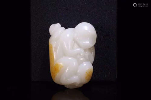 A HETIAN JADE ORNAMENT OF STORY SHAPED