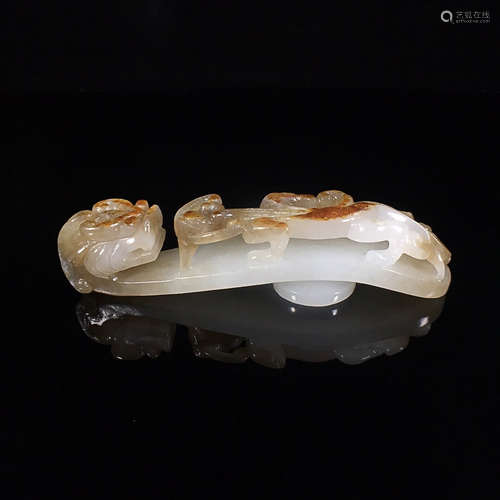 A HETIAN JADE ORNAMENT OF STORY SHAPED