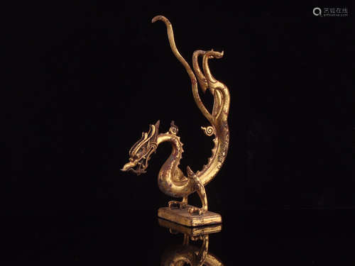 A GILT BRONZE DRAGON DESIGN ORNAMENTS