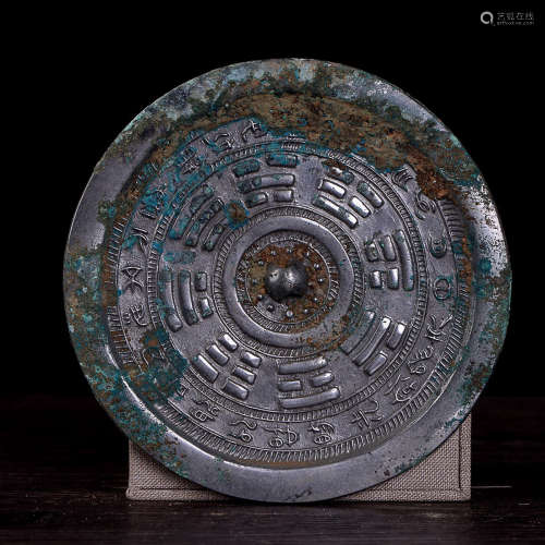 A BRONZE MIRROR OF BAGUA CARVING