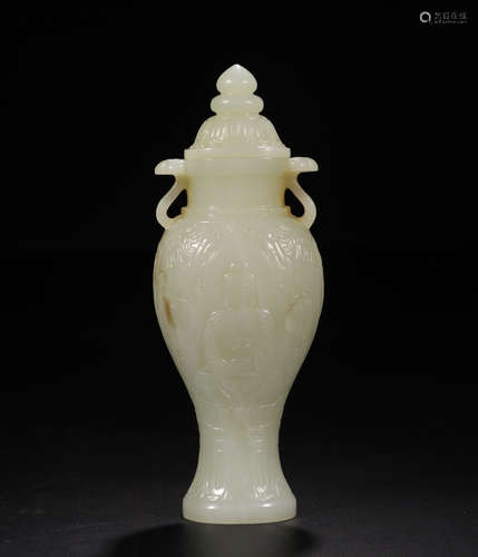 A HETIAN JADE VASE CARVED BUDDHA PATTERN