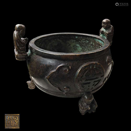 A TRI-LEG BRONZE CENSER