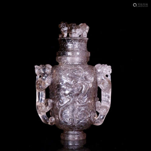 A CRYSTAL VASE CARVED DRAGON PATTERN