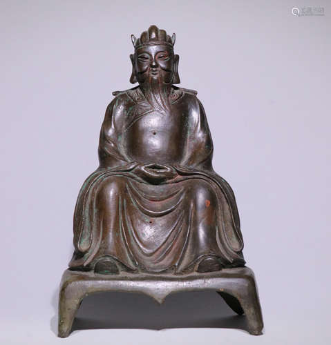 A PURPLE BRONZE FIGURE SHAPED ORNAMENT