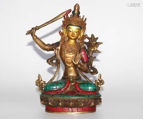 A BRONZE BUDDHA FIGURE