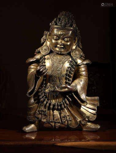 A GILT BRONZE GUANYIN SHAPED BUDDHA