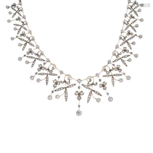 An Edwardian gold and silver diamond necklace. Designed