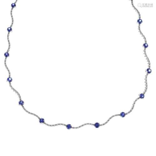 An 18ct gold sapphire and diamond necklace. The