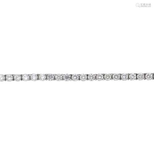 A diamond bracelet. The brilliant-cut diamond line,