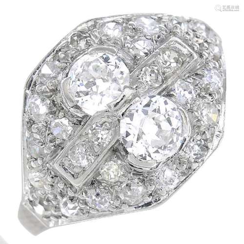 A diamond dress ring. The old-cut diamond duo,