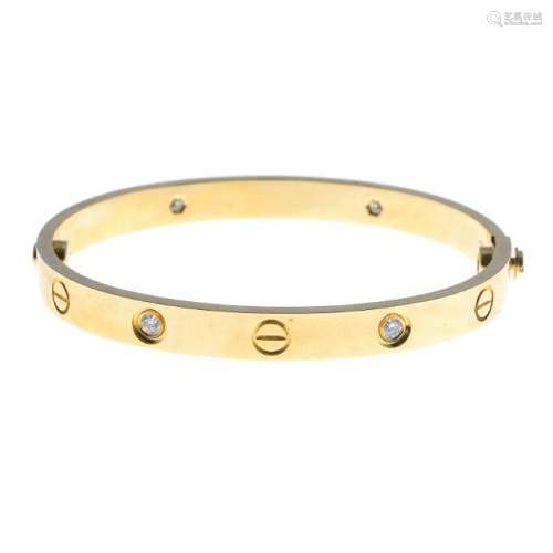 CARTIER - a diamond 'Love' bangle. Comprising an