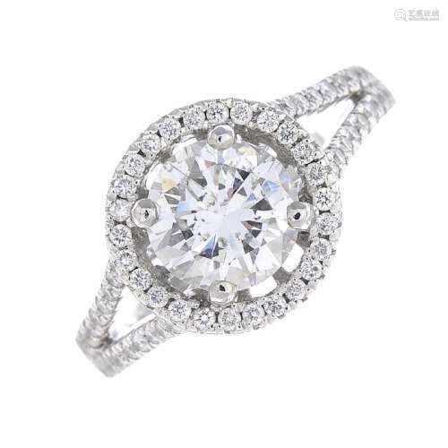 A platinum diamond cluster ring. The brilliant-cut