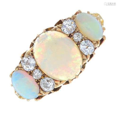 An Edwardian 18ct gold opal three-stone and diamond