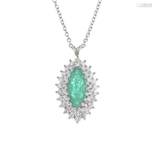An 18ct gold emerald and diamond cluster pendant. The