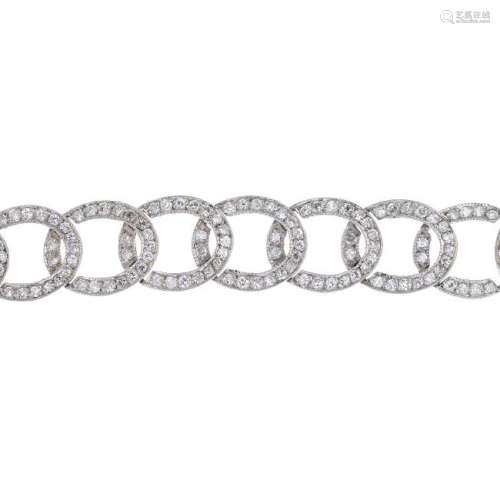 A diamond bracelet. Designed as a series of pave-set
