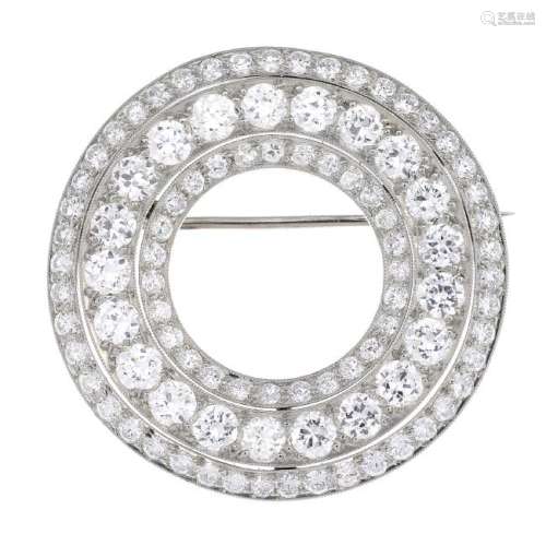 CARTIER - an Art Deco platinum diamond wreath brooch.