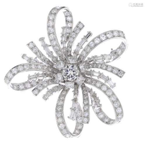 A diamond brooch. The brilliant-cut diamond cluster,