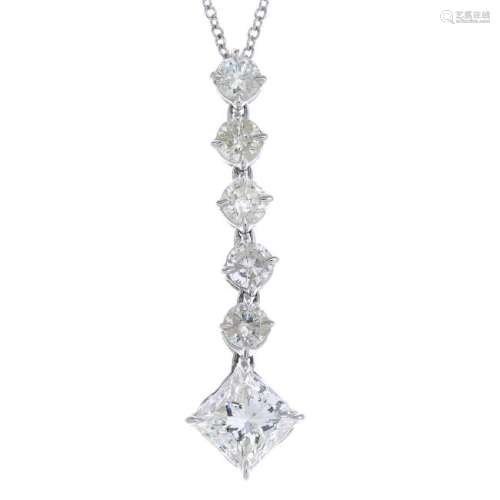 A diamond pendant. The square-shape diamond, suspended