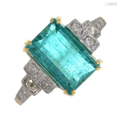 A Colombian emerald and diamond dress ring. The