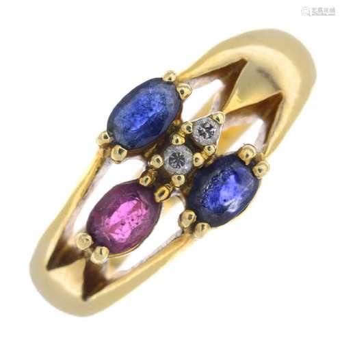 A diamond and gem-set dress ring. Of openwork design,