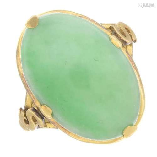 A 22ct gold jade single-stone ring. The oval jadeite