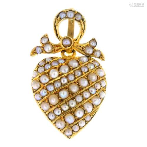 A split pearl heart locket. The split pearl heart,