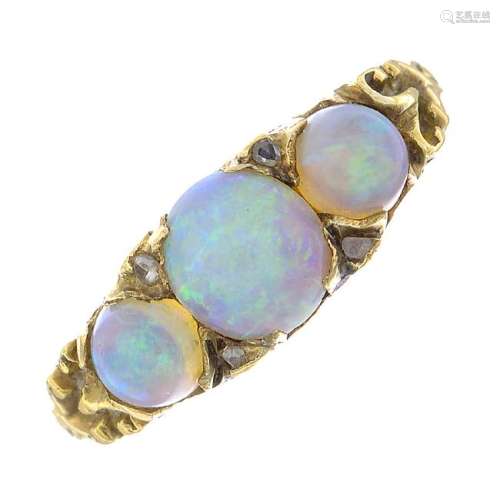 An early 20th century 18ct gold opal three-stone and