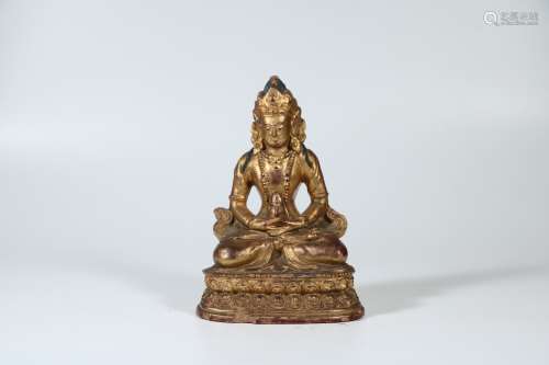A Chinese Gilt Clay Buddha