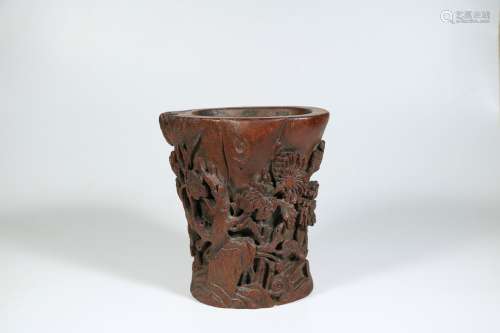 A Chinese Carved Chenxiang Brush Pot