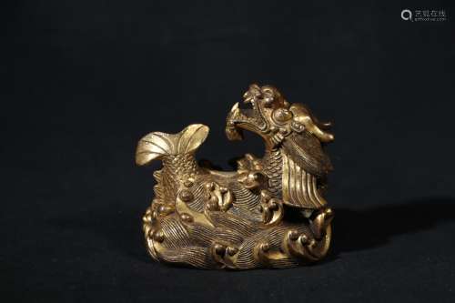 A Chinese Gilt Bronze Paper Weight