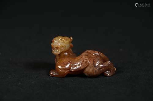 A Chinese Carved Jade Foo-Dog