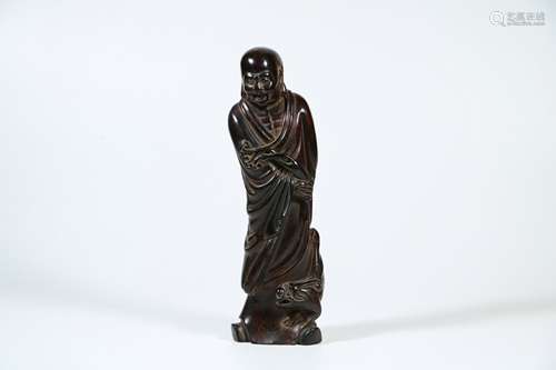 A Chinese Carved Zitan Buddha