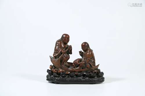 A Chinese Carved Tanxiang Figures of Buddha