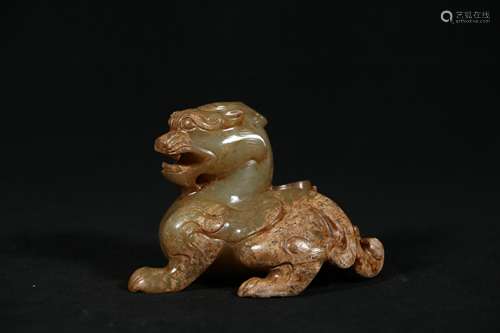 A Chinese Carved Jade Foo-Dog