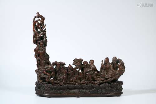A Chinese Carved Chenxiang Baxian Decoration