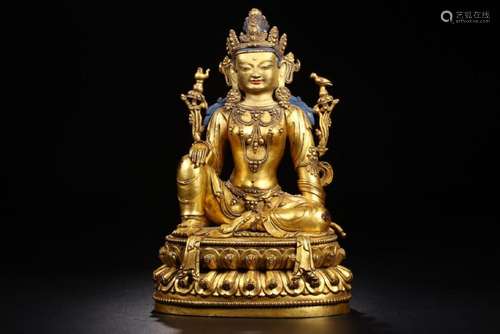 A GILT-BRONZE FIGURE OF GUANYIN.MING DYNASTY