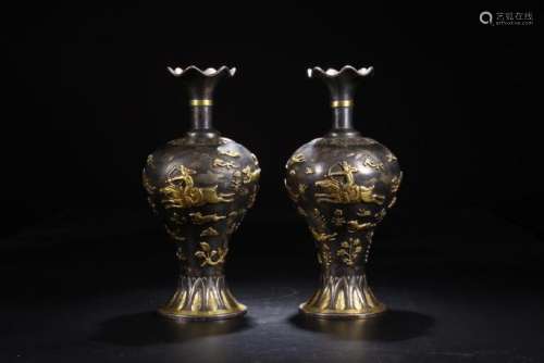 A PAIR OF GILT-SILVER VASES.TANG DYNASTY